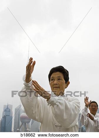 Seniors practicing tai chi. View Large Photo Image Stock Image - Seniors practicing tai chi.. Fotosearch