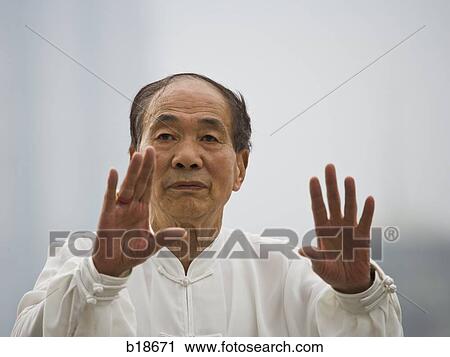Seniors practicing tai chi. View Large Photo Image Stock Image - Seniors practicing tai chi.. Fotosearch