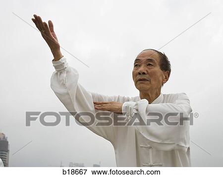 Seniors practicing tai chi. View Large Photo Image Stock Photo - Seniors practicing tai chi.. Fotosearch