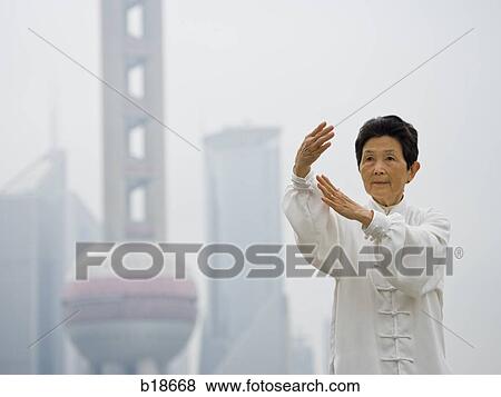 Seniors practicing tai chi. View Large Photo Image Stock Photo - Seniors practicing tai chi.. Fotosearch