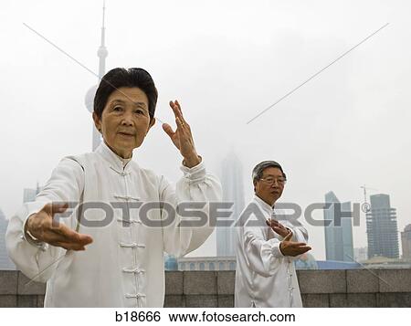 Seniors practicing tai chi. View Large Photo Image Stock Photograph - Seniors practicing tai chi.. Fotosearch