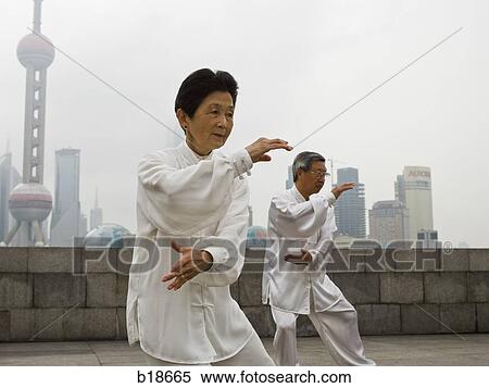 Seniors practicing tai chi. View Large Photo Image Stock Photography - Seniors practicing tai chi.. Fotosearch