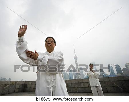 Seniors practicing tai chi. View Large Photo Image Stock Photography - Seniors practicing tai chi.. Fotosearch