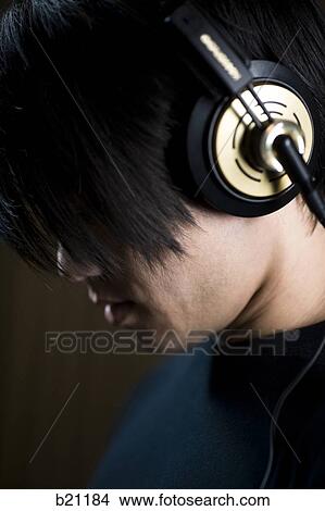Picture - singing in a recording studio. Fotosearch
