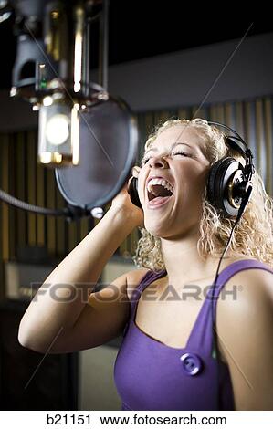 singing in a recording studio View Large Photo Image Stock Image - singing in a recording studio. Fotosearch