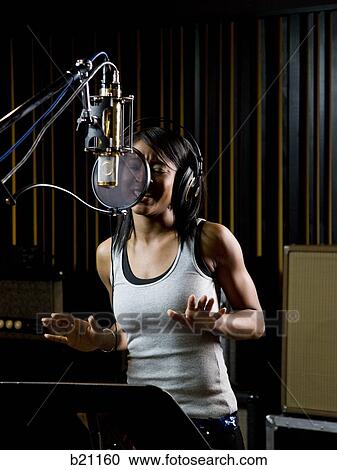 singing in a recording studio View Large Photo Image Stock Image - singing in a recording studio. Fotosearch
