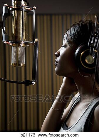 singing in a recording studio View Large Photo Image Stock Image - singing in a recording studio. Fotosearch