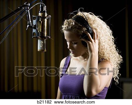 singing in a recording studio View Large Photo Image Stock Image - singing in a recording studio. Fotosearch