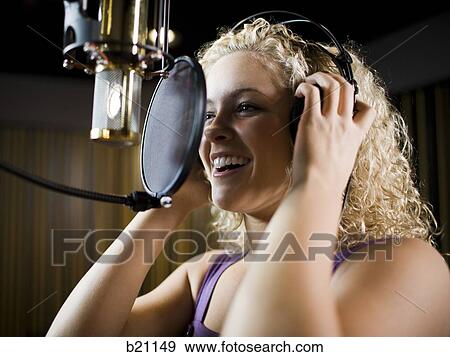singing in a recording studio View Large Photo Image Stock Photo - singing in a recording studio. Fotosearch