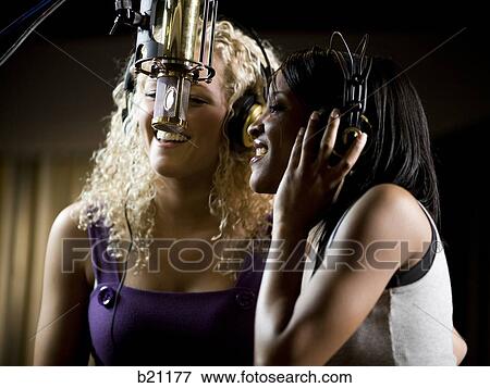 singing in a recording studio View Large Photo Image Stock Photo - singing in a recording studio. Fotosearch