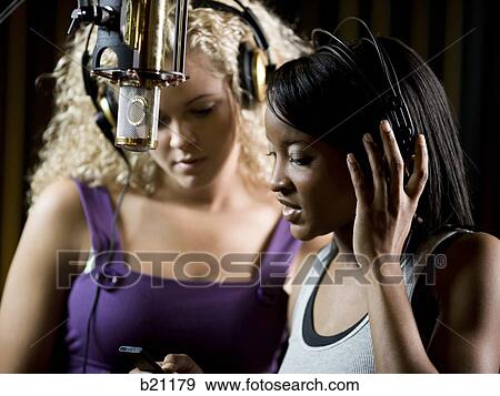 singing in a recording studio View Large Photo Image Stock Photo - singing in a recording studio. Fotosearch