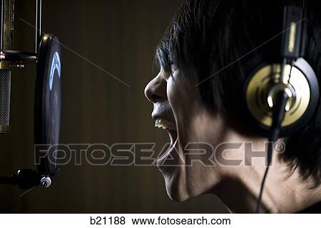 singing in a recording studio View Large Photo Image Stock Photo - singing in a recording studio. Fotosearch