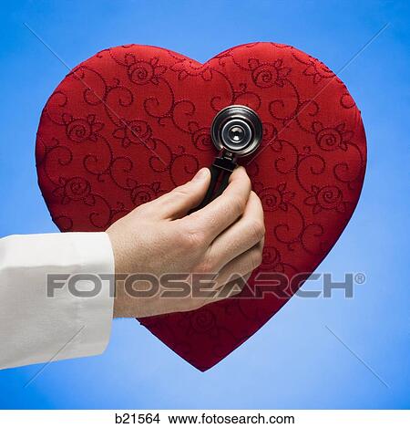 Picture - stethoscope on heart. Fotosearch