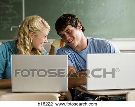 Students in a classroom with notebook computers. View Large Photo Image Stock Image - Students in a classroom with notebook computers.. Fotosearch
