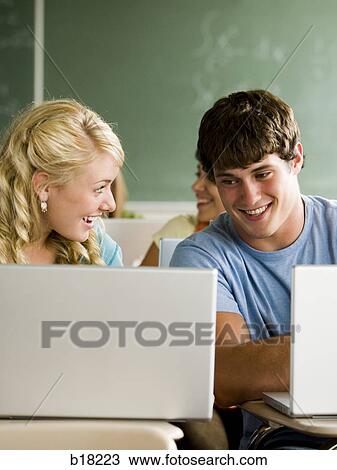 Students in a classroom with notebook computers. View Large Photo Image Stock Image - Students in a classroom with notebook computers.. Fotosearch