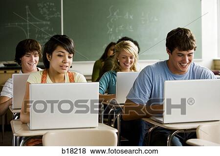Students in a classroom with notebook computers. View Large Photo Image Stock Photo - Students in a classroom with notebook computers.. Fotosearch