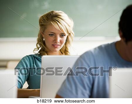 Students in a classroom with notebook computers. View Large Photo Image Stock Photo - Students in a classroom with notebook computers.. Fotosearch