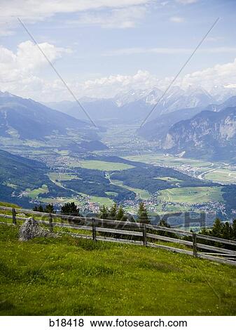 Sunlight over a pasture. View Large Photo Image Stock Photo - Sunlight over a pasture.. Fotosearch