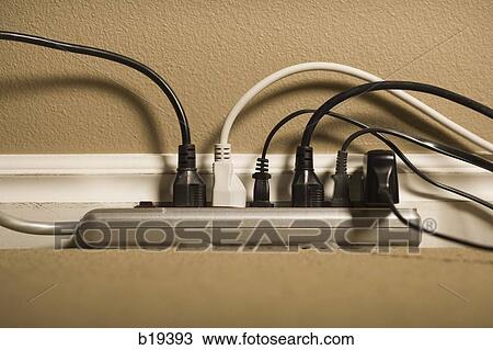 Stock Image - surge protector with plugs in it. Fotosearch