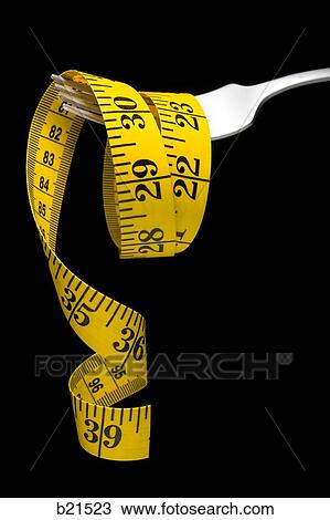 tape measure on a fork View Large Photo Image Stock Image - tape measure on a fork. Fotosearch