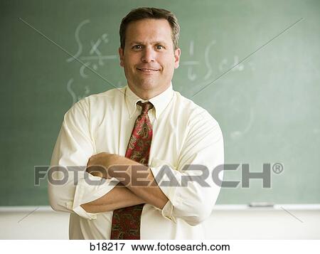 Stock Photo - Teacher in a classroom.. Fotosearch
