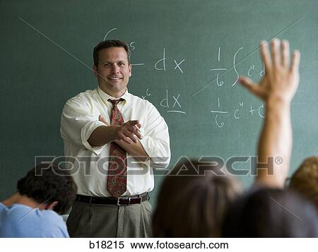 Stock Photography - Teacher in a classroom.. Fotosearch
