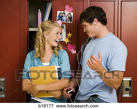 Teenage couple at school. View Large Photo Image Stock Photo - Teenage couple at school.. Fotosearch