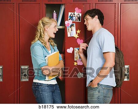 Teenage couple at school. View Large Photo Image Stock Photography - Teenage couple at school.. Fotosearch