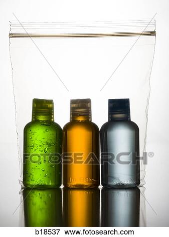 three different Colored bottles in a plastic bag. View Large Photo Image Stock Photo - three different Colored bottles in a plastic bag.. Fotosearch