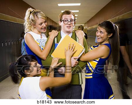 Three female and one male High School Students. View Large Photo Image Stock Image - Three female and one male High School Students.. Fotosearch