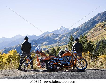 two bikers stopping to pee View Large Photo Image Stock Photo - two bikers stopping to pee. Fotosearch