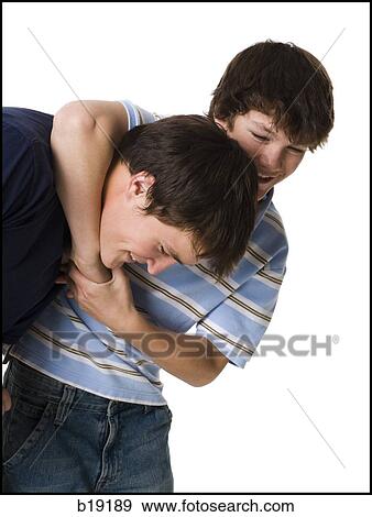 two brothers wrestling. View Large Photo Image Stock Photo - two brothers wrestling.. Fotosearch