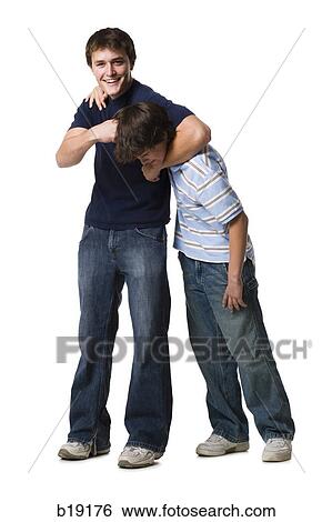 two brothers wrestling. View Large Photo Image Stock Photograph - two brothers wrestling.. Fotosearch