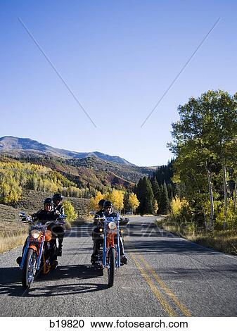 two couples on motorcycles View Large Photo Image Stock Image - two couples on motorcycles. Fotosearch