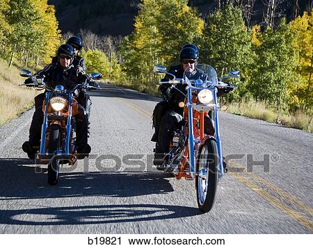 two couples on motorcycles View Large Photo Image Stock Image - two couples on motorcycles. Fotosearch