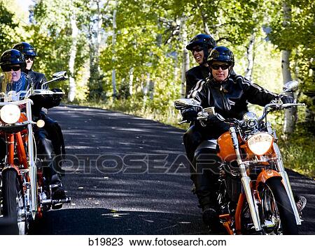 two couples on motorcycles View Large Photo Image Stock Image - two couples on motorcycles. Fotosearch