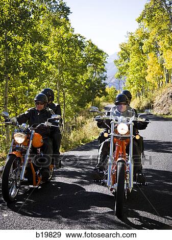 two couples on motorcycles View Large Photo Image Stock Photo - two couples on motorcycles. Fotosearch