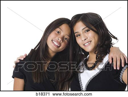 Two girls with arms around each other. View Large Photo Image Stock Image - Two girls with arms around each other.. Fotosearch