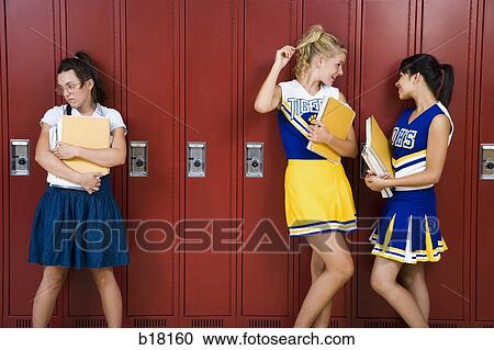 Two High School cheer leaders and a nerd. View Large Photo Image Stock Image - Two High School cheer leaders and a nerd.. Fotosearch