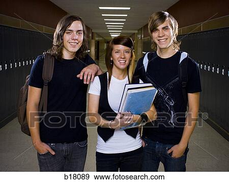 Two male and one female High School Students. View Large Photo Image Stock Photo - Two male and one female High School Students.. Fotosearch