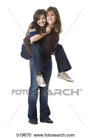 two woman looking at camera View Large Photo Image Stock Image - two woman looking at camera. Fotosearch