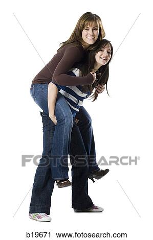 two woman looking at camera View Large Photo Image Stock Image - two woman looking at camera. Fotosearch
