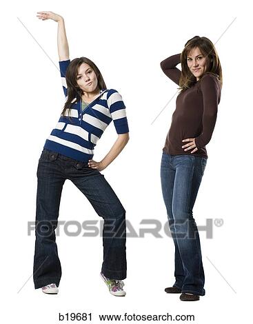 Stock Image - two woman looking at camera. Fotosearch