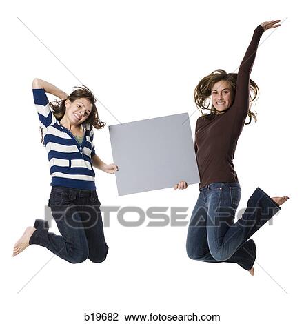 two woman looking at camera View Large Photo Image Stock Image - two woman looking at camera. Fotosearch