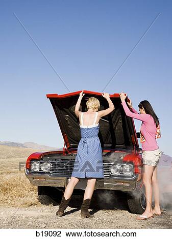 two woman with car trouble. View Large Photo Image Stock Image - two woman with car trouble.. Fotosearch