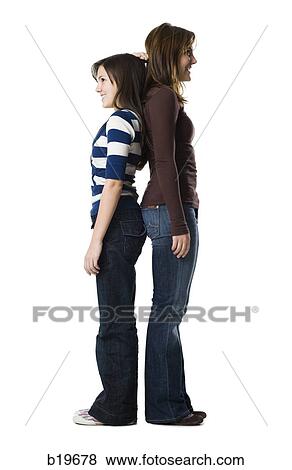two women back to back View Large Photo Image Stock Photo - two women back to back. Fotosearch