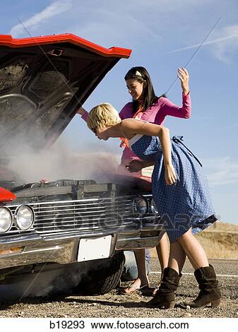 Stock Photo Of Two Women With A Broken Down Car B19293 Search Stock Photo Two Women With A Broken Down Car Fotosearch Search Images