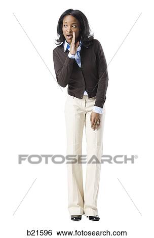 Stock Photograph - whispering businesswoman. Fotosearch