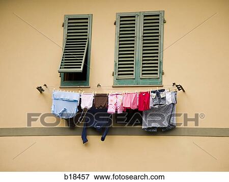 Window with clothesline hanging below it. View Large Photo Image Stock Photo - Window with clothesline hanging below it.. Fotosearch