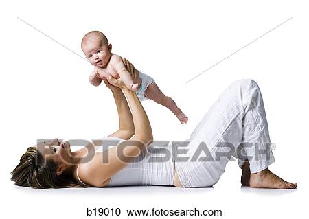 Woman and baby. View Large Photo Image Stock Image - Woman and baby.. Fotosearch
